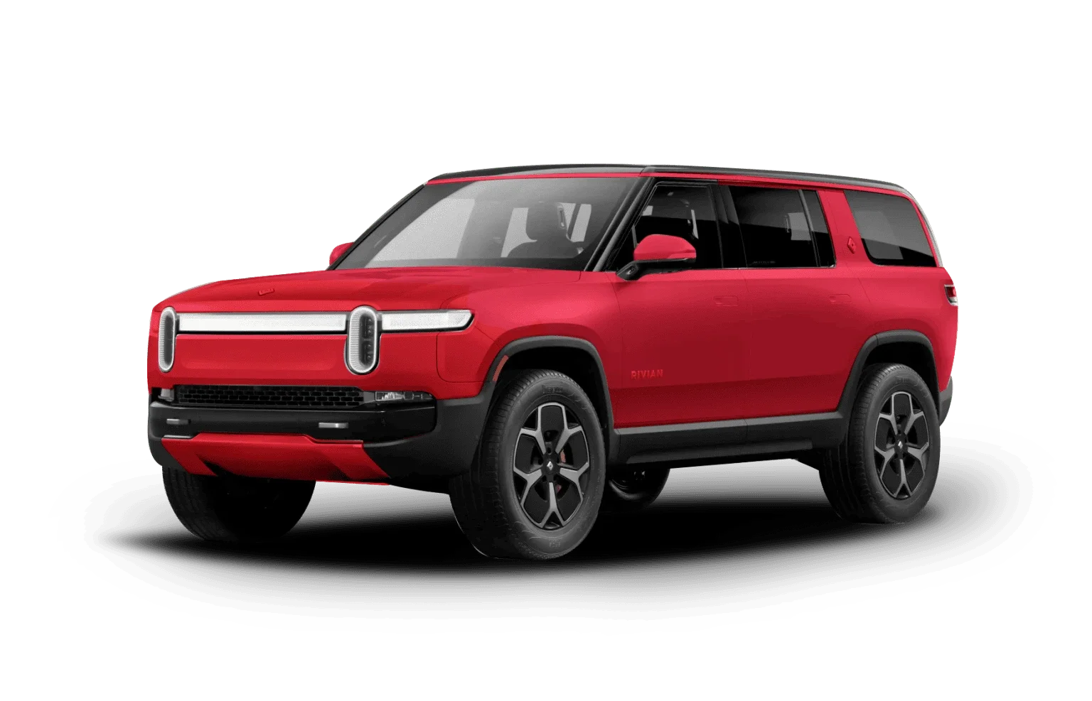 A red Rivian R1S electric SUV, shown at an angle from the front, with black trim and multi-spoke wheels.