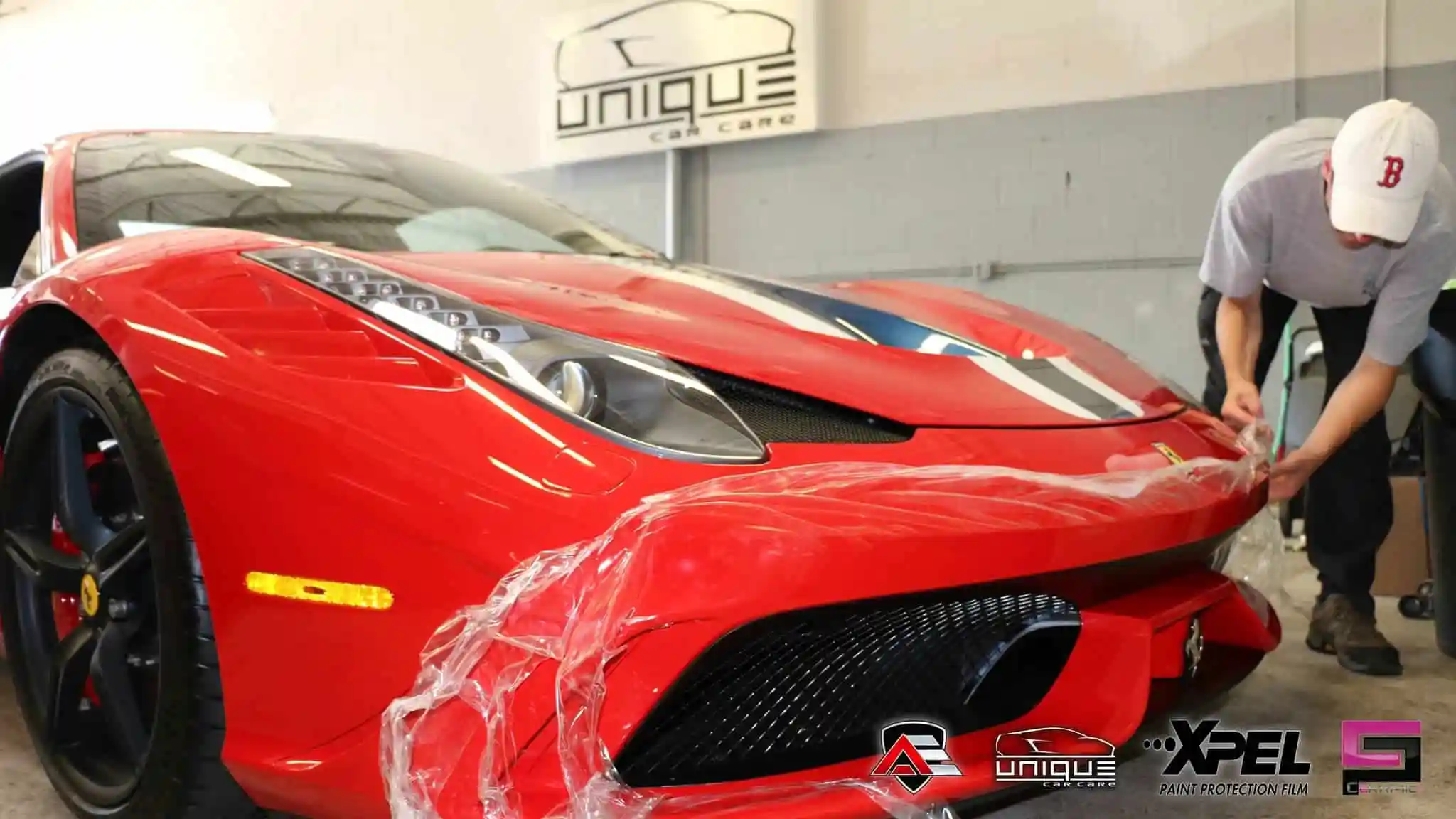 Rear view of a red Ferrari 458 Speciale with dual exhaust outlets