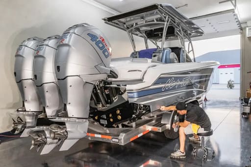 guy cleaning a boat